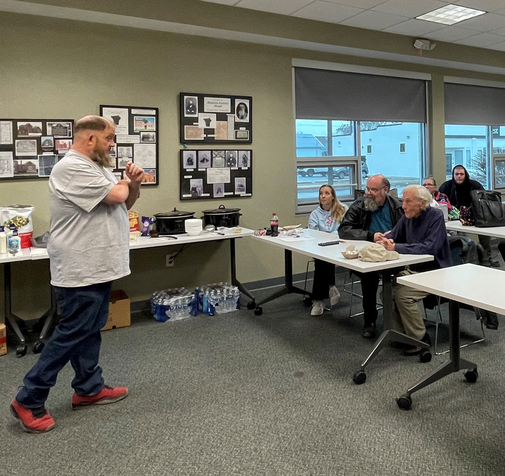 President Frank Staples leads the Stringtown neighborhood association’s February meeting