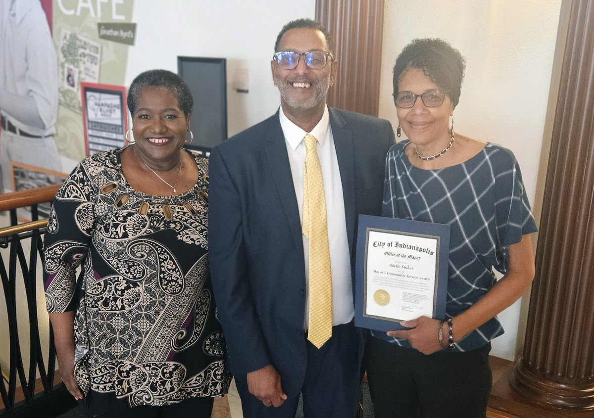 Adelle Stokes pictured with her Mayor’s Community Service Award certificate, joined by Pam Hardy and Ron Rice.
